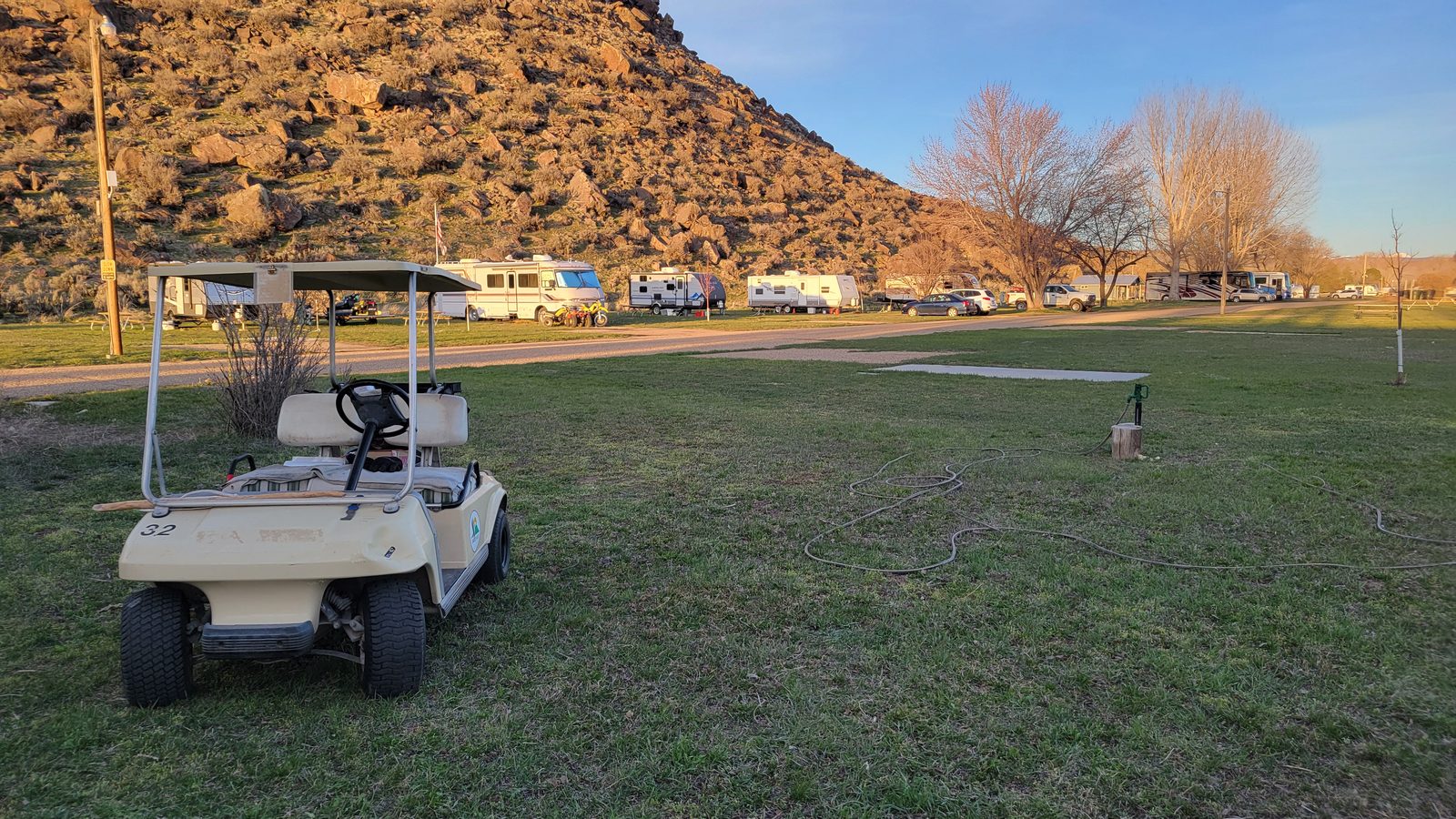 The park beneath the rock butte