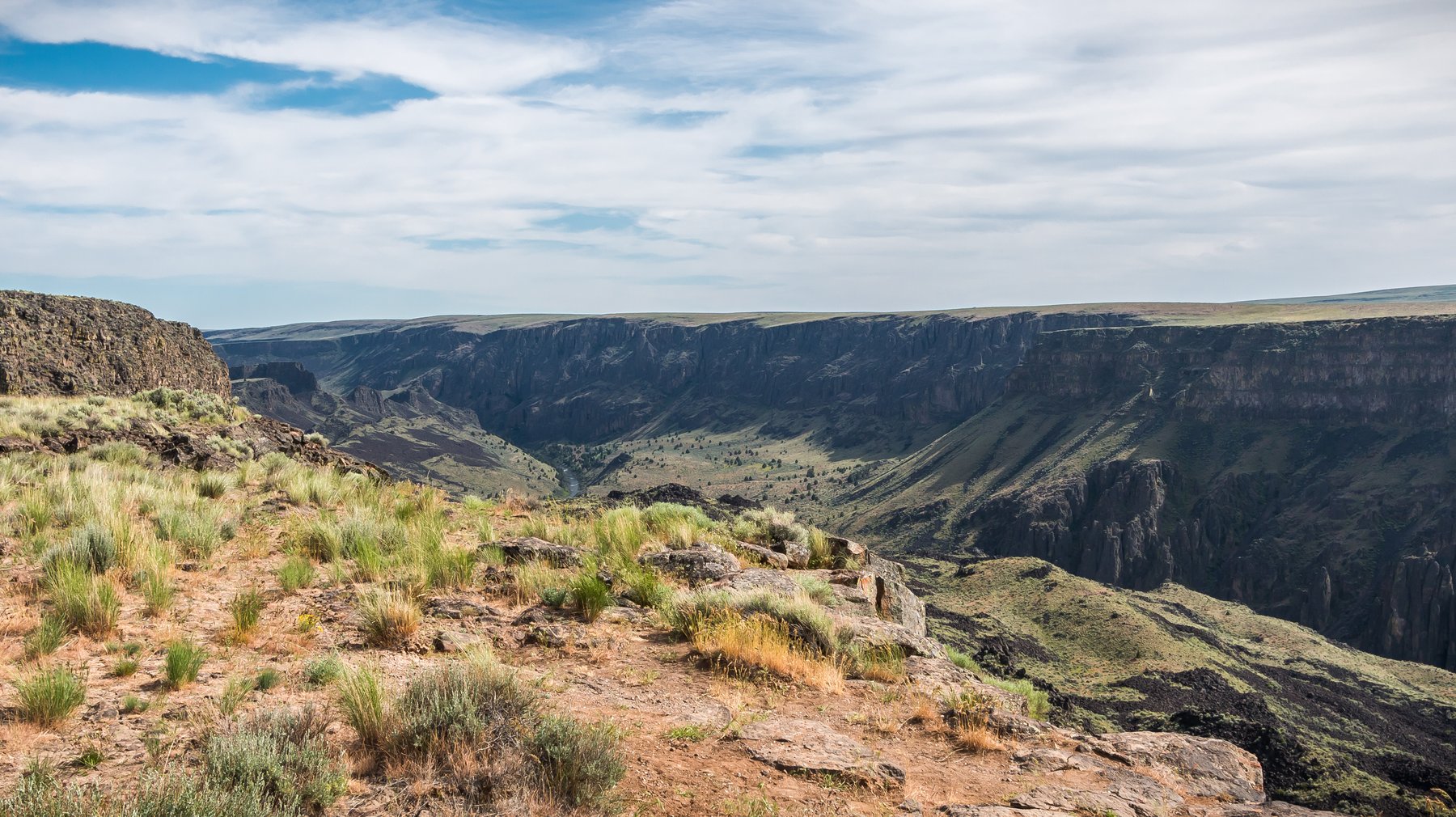 Owyhee Reservoir winding through a painted canyon